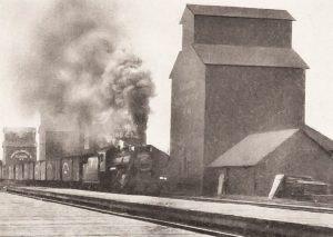 Dauphin grain elevators and steam engine, date unknown.