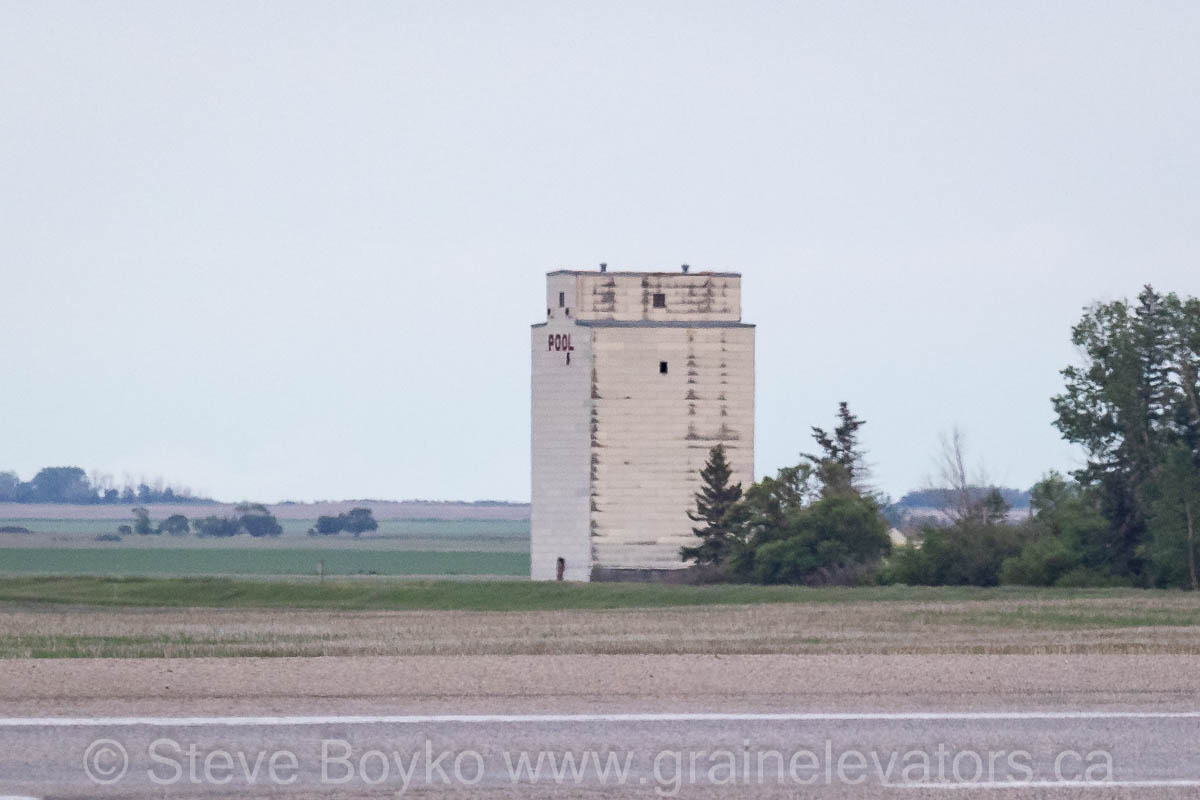 Grain elevator annex in a field